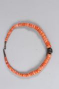 A CORAL NECKLACE.