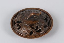 A TIBETAN BRONZE INCENSE BURNER. 11cms diameter.