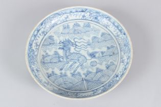 A QING DYNASTY BLUE AND WHITE DISH. 29cms diameter.
