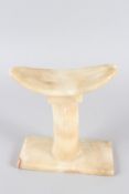 AN EGYPTIAN ALABASTER HEADREST, OLD KINGDOM, 6TH DYNASTY, Circa. 2323-2150 BC, in three parts,