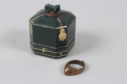 AN ISLAMIC BRONZE ARCHERS THUMB RING.