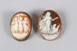 A YELLOW METAL MOUNTED CAMEO BROOCH / PENDANT; together with another cameo brooch. 3.5cms high.