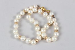 A GOOD STRING OF PEARLS. 35.5cms.