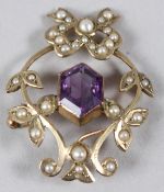 A YELLOW METAL, AMETHYST AND SEED PEARL BROOCH / PENDANT, with ribbon and bow mount. 22mm wide.