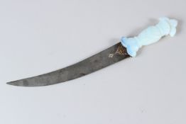 AN INDIAN KHANJAR DAGGER, with decorative opaque opal glass handle, curving steel blade with gilt
