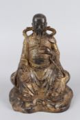 A CHINESE GILT BRONZE STATUE OF GUANDI. 26cms high.
