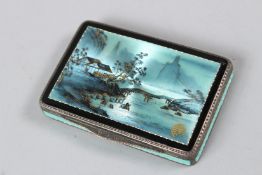 A GOOD SILVER, SILVER GILT AND ENAMEL BOX, the hinged cover decorated with a mountainous river