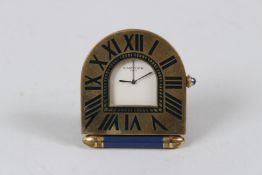 A CARTIER OF PARIS QUARTZ FOLDING TRAVELLING CLOCK, No. 357202950. 5.4cms.