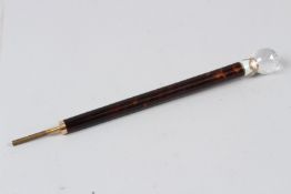 A RUSSIAN GOLD AND ENAMEL PARASOL HANDLE. 24cms long.