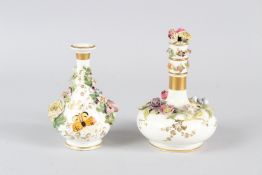 TWO 19TH CENTURY ROCKINGHAM PORCELAIN BOTTLES, both with applied floral decoration, the smaller