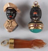 THREE DECORATIVE PENDANTS, with yellow metal mounts.