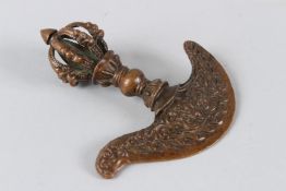 A SMALL TIBETAN BRONZE RITUALISTIC AXE. 12cms long.