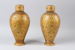A VERY FINE AND LARGE PAIR OF 19TH CENTURY INDIAN KASHMIRI LACQUERED TEA CADDY. 30cms high.