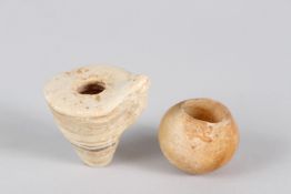 AN EGYPTIAN ALABASTER AMULET, MIDDLE OR NEW KINGDOM, carved with a frog; together with a small