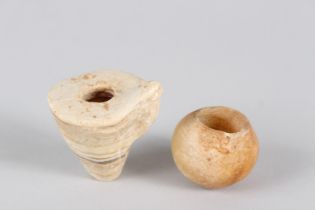 AN EGYPTIAN ALABASTER AMULET, MIDDLE OR NEW KINGDOM, carved with a frog; together with a small
