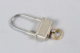 A CARTIER SILVER KEYRING. 5cms.