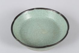 A CHINESE RU WARE DISH. 15cms diameter.