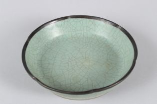 A CHINESE RU WARE DISH. 15cms diameter.