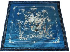 A LATE 19TH CENTURY / EARLY 20TH CENTURY CHINESE SILKWORK PANEL, rich blue ground embroidered with