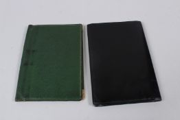 TWO GUCCI LEATHER WALLETS.