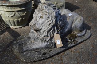 Reconstituted stone model of a recumbent lion.