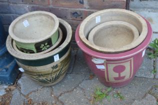 A group of garden pots.