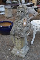 A good large weathered reconstituted stone model of a rampant lion holding a shield.