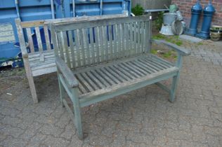 A hardwood garden bench.