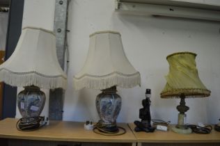A pair of Chinese style porcelain table lamps and two other lamps.