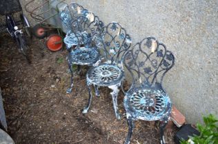 A set of four painted aluminium garden chairs.