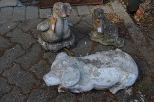 Reconstituted stone animals and birds to include a pig, an otter and a swan water fountain.