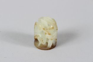 A 19TH CENTURY CHINESE OPENWORK CELADON JADE CARVING with pine and cranes. 1.25ins.