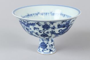 A CHINESE BLUE AND WHITE DRAGON STEM CUP. 6.5ins diameter.