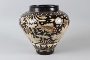 A CHINESE CIZHAU JAR. 10ins high.