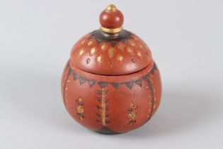 A TURKISH TOPHANE POTTERY SUGAR POT AND COVER, with gilded incised decoration. 12cms high.