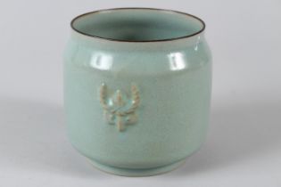 A CHINESE RU WARE POT with dragon handles. 4.5ins high.