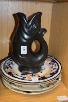 A fish jug and other items.