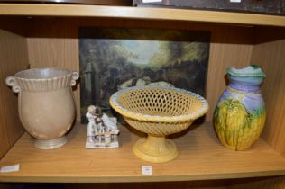 A majolica jug and other items.