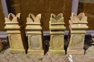 A good set of four buff coloured terracotta chimney pots.