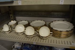 Quantity of Minton Versailles dinnerware to include numerous plates and soup bowls.