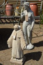 Two reconstituted stone figures.