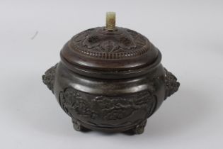 A FINE CHINESE LIDDED BRONZE INCENSE BURNER decorated with five bats and longevity "Shou" medallions