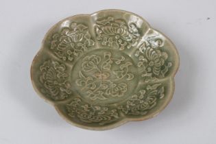 A CHINESE YAOZHOU-STYLE CELEDON LOBEL DISH 5.5ins