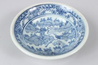 A CHINESE BLUE AND WHITE BOWL with Kylin decoration 27cm