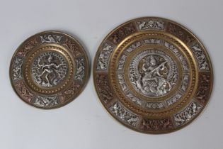 TWO SOUTH INDIAN TANJORE SILVER AND COPPER OVERLAID BRASS DISHES 21cm & 31cm diameter