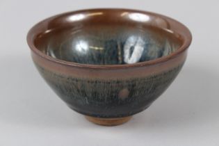 A JIANYAO TEA BOWL, hares fare glaze.