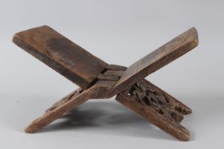 A FINELY CARVED 19TH CENTURY MALAY OR INDONESIAN POLYCHROMED WOODEN QUARN STAND 38cm x 33cm x 15cm