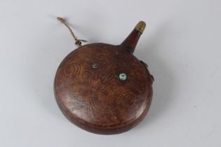 A RARE 17TH / 18TH CENTURY OTTOMAN LEATHER FLASK 18cm long.