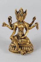 A FINE TIBETAN OR NEPALESE GILDED BRONZE BUDDHA, 12cm high