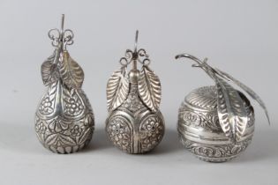 A COLLECTION OF THREE MIDDLE EASTERN WHITE METAL FRUIT SHAPED BOXES 325gms, 15icm, 14cm & 12icm